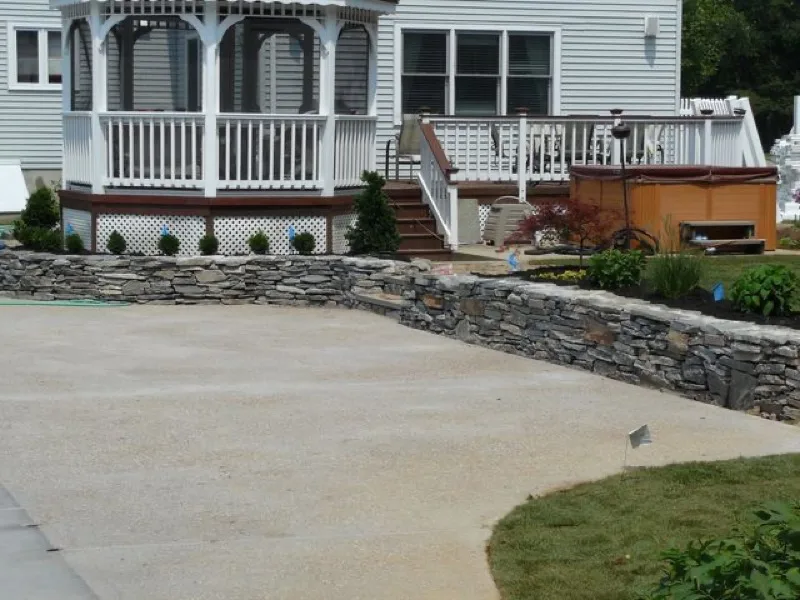 White picket fence framing a well-kept front lawn